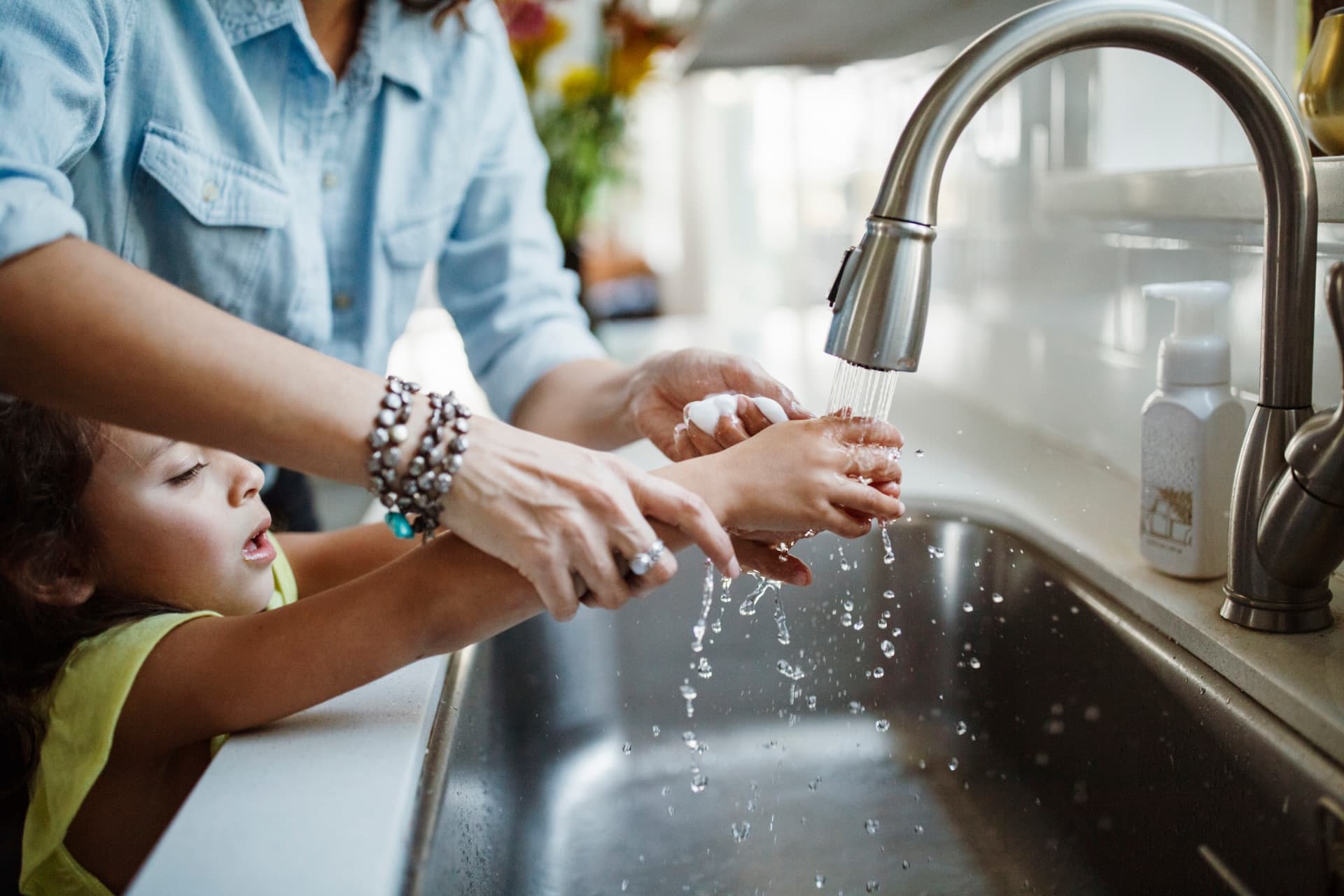 Mother and child with clean water